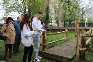 Ribbon cutting at the opening of a memorial garden at Hamsey Green Pond