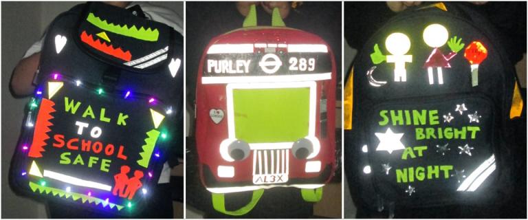 Brighten Your Bag examples, with children's backpacks decorated in reflective tape with a picture of a bus and colourful slogans: Walk to school safe, shine bright at night 
