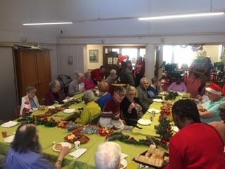Group having Christmas lunch