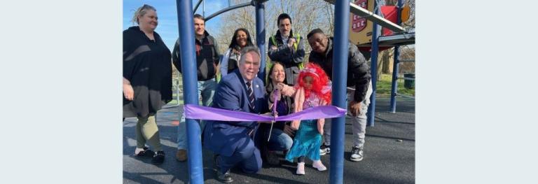 Mayor Perry with residents at the playground opening