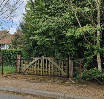 photograph of original timber gates and piers
