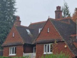 House with hanging tiles design
