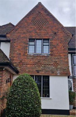 House with hanging tiles design