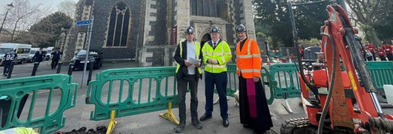 Mayor Perry with David Saxby and Father Andrew Bishop in front of Croydon Minster repair works