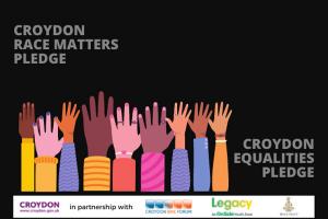 Graphic of multi-cultural hands raised in the air