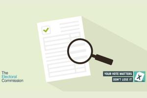 graphic with a magnifying glass hovering over a piece of paper with a tick on it