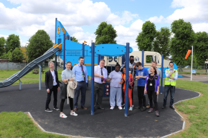 Mayor Perry & Cllr Roche with local park users and ward councillors in front of new playground equipment in Purley Way Playing Fields