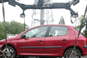 A car on top of a tow truck