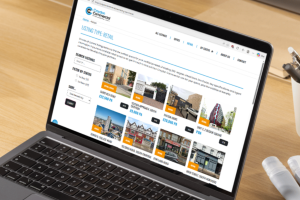 A laptop screen with the Croydon Commercial website on display