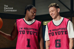 Electoral Commission advert with two young men in basketball shirts which say I'm registered to vote