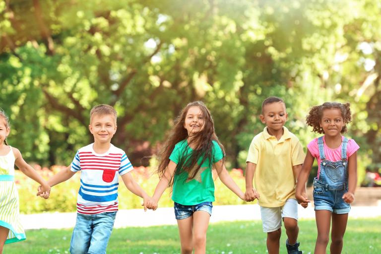 Decorative image of children in a field