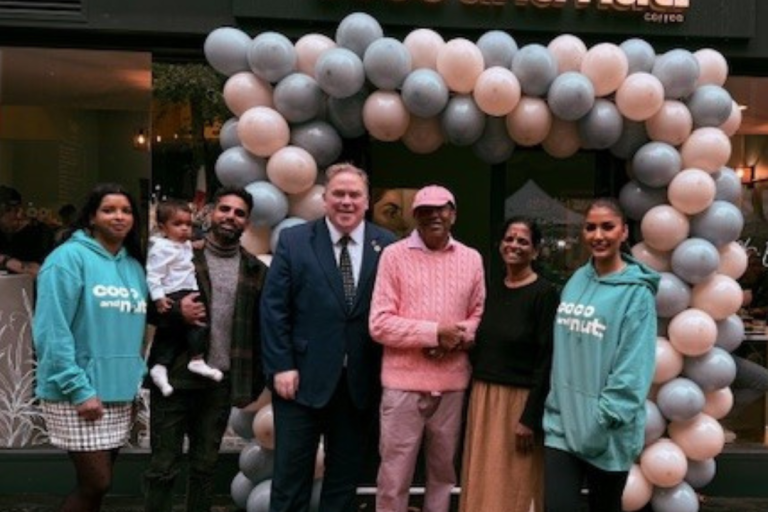 Mayor Perry with members of staff outside Coco and nut shop