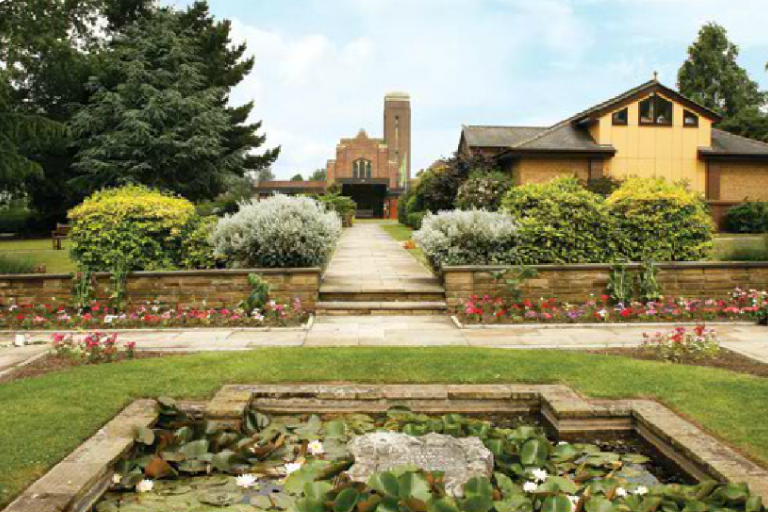 An ornamental pond and walled garden in the grounds a crematorium in Croydon 