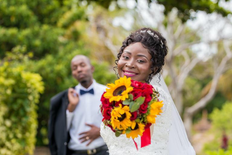 woman holding a wedding bouquet 
